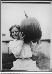 Girl with pumpkin from Tretheway farm ca. 1909